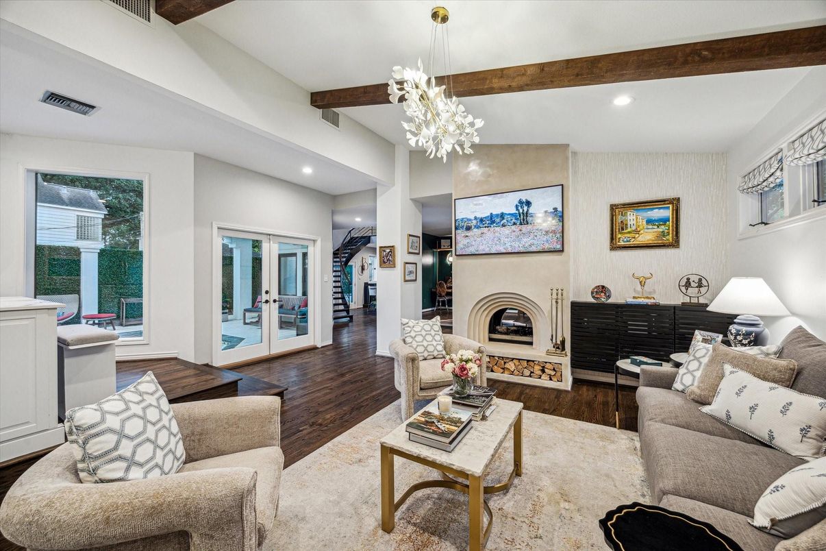 Chandelier, Fireplace, Interior, Living room, Pendant Lights, Recessed Lighting, Wooden Beams, Wood Texture Flooring