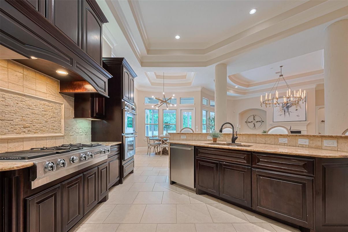 Chandelier, Dining room, Interior, Kitchen, Recessed Lighting, Stainless Steel Appliances, Stone Walls, Water