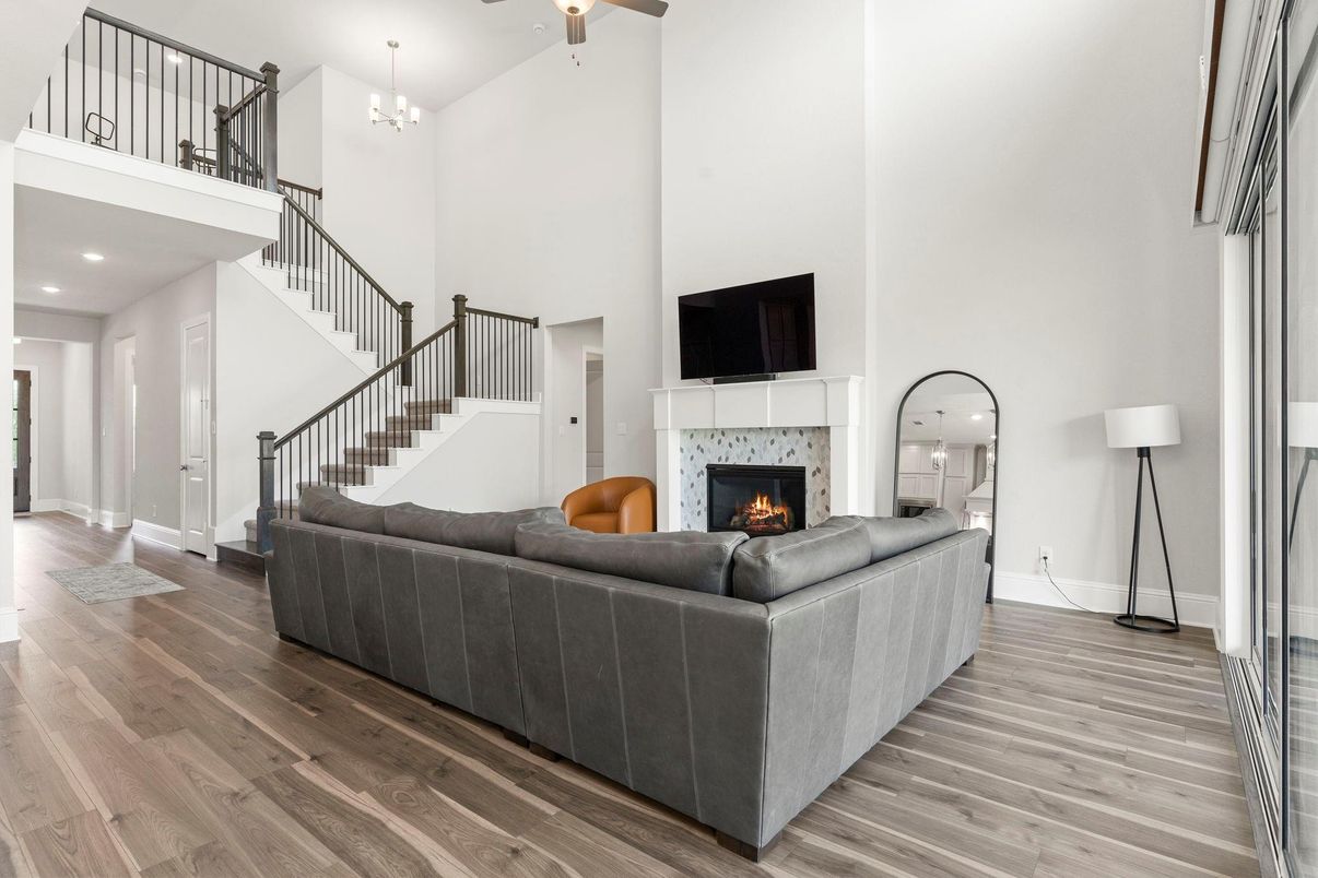 Chandelier, Fireplace, Interior, Living room, Recessed Lighting, Wood Texture Flooring