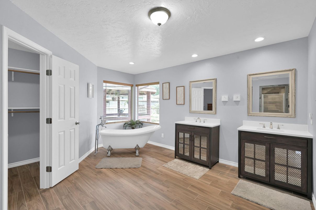 Bathroom, Dual Sink Vanities, Free Standing Baths, Interior, Recessed Lighting, Wood Texture Flooring