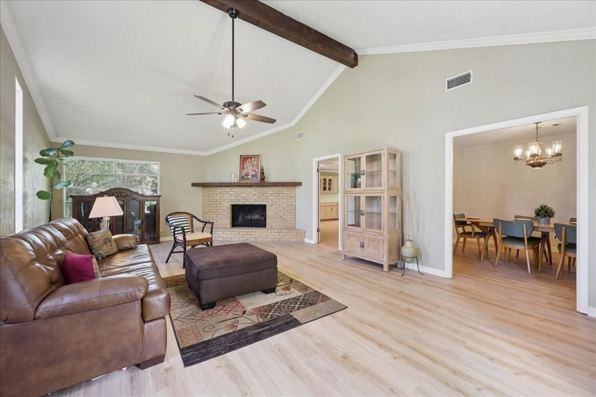 Chandelier, Dining room, Fireplace, Interior, Living room, Stone Walls, Wooden Beams, Wood Texture Flooring