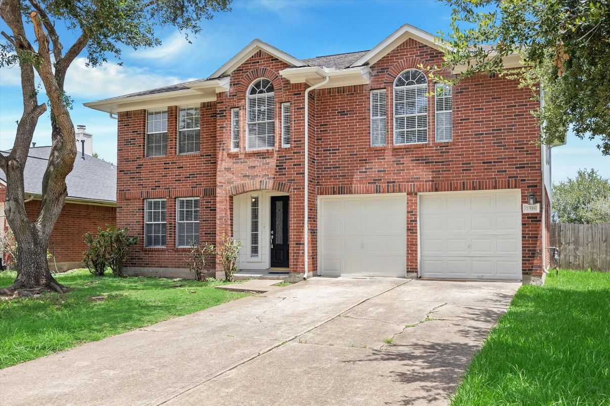 Attached, Exterior, Facade, Brick Facade, Brick Traditional