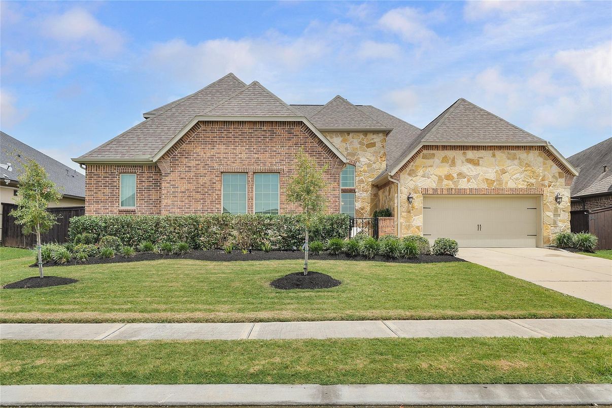 Attached, Exterior, Facade, Brick Facade, Brick Traditional