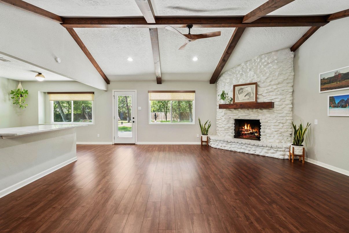 Empty room, Fireplace, Interior, Recessed Lighting, Wooden Beams, Wood Texture Flooring