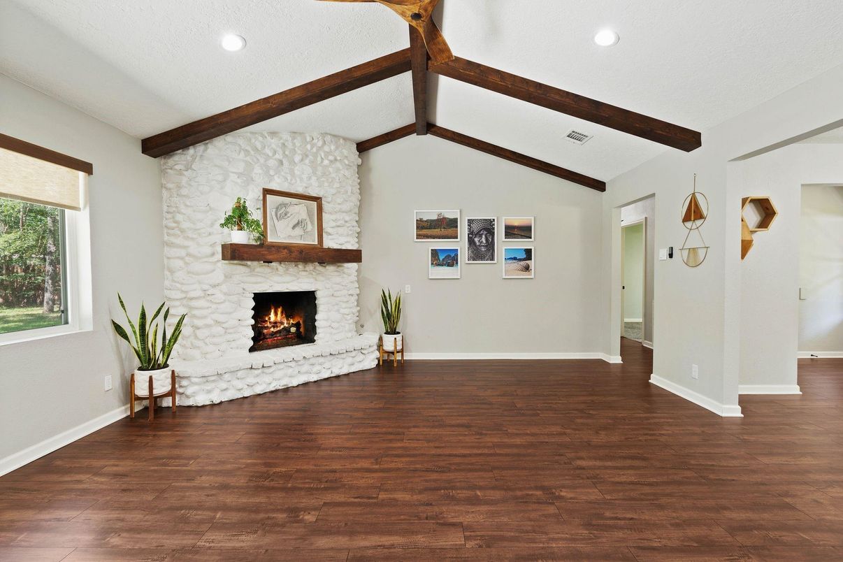 Empty room, Fireplace, Interior, Recessed Lighting, Wooden Beams, Wood Texture Flooring