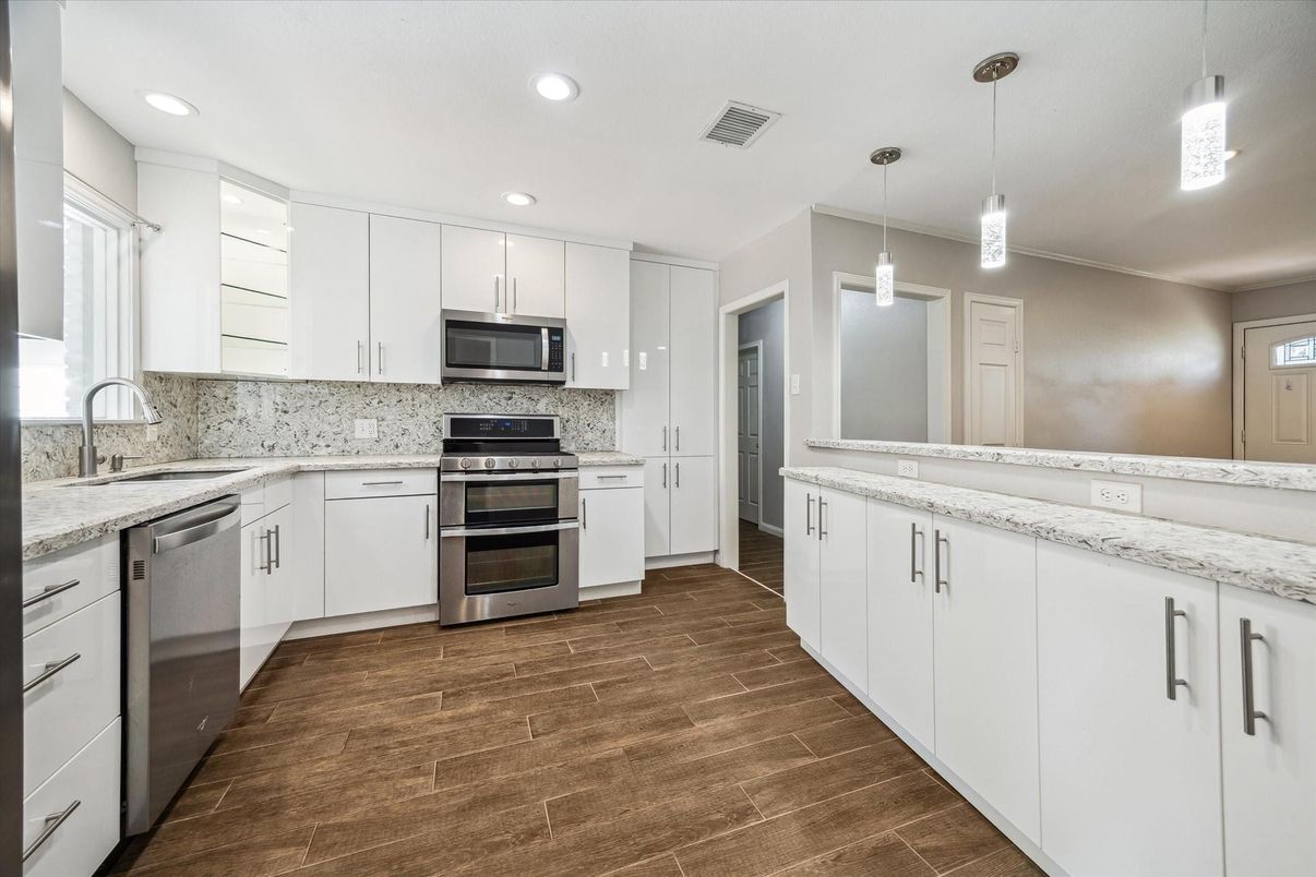 Interior, Kitchen, Pendant Lights, Recessed Lighting, Stainless Steel Appliances, Wood Texture Flooring
