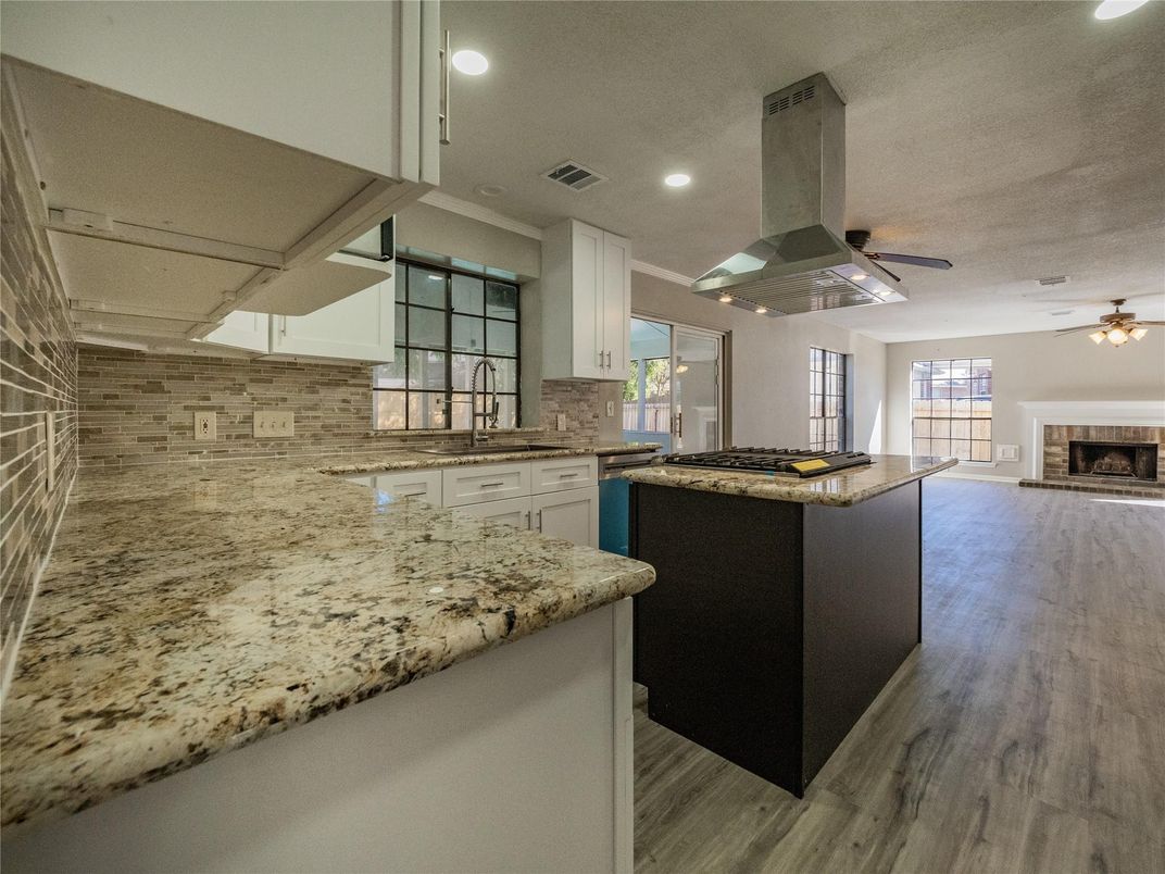 Fireplace, Interior, Kitchen, Recessed Lighting, Wood Texture Flooring
