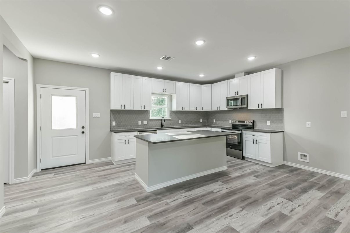 Interior, Kitchen, Recessed Lighting, Stainless Steel Appliances, Wood Texture Flooring