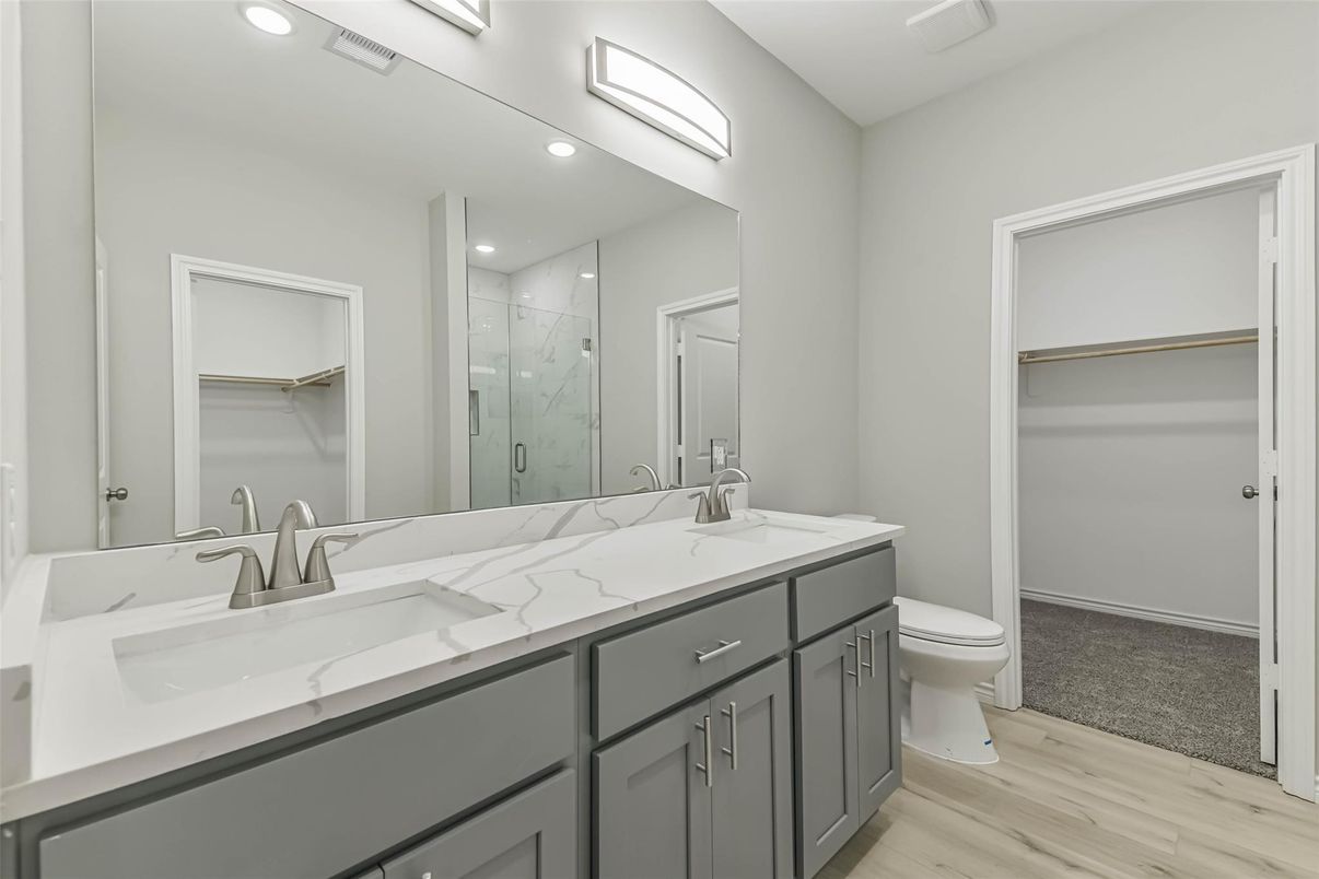 Bathroom, Dual Sink Vanities, Glass Shower, Interior, Recessed Lighting, Wood Texture Flooring