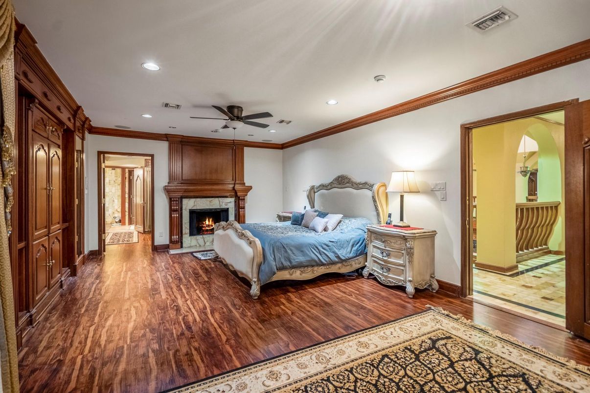 Bedroom, Fireplace, Interior, Recessed Lighting, Wood Texture Flooring