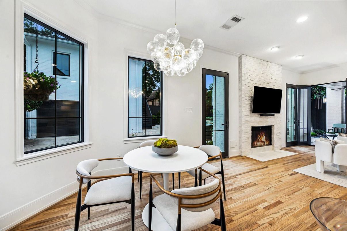 Dining room, Fireplace, Interior, Pendant Lights, Recessed Lighting, Stone Walls, Wood Texture Flooring