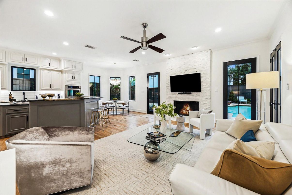 Fireplace, Interior, Kitchen, Living room, Recessed Lighting, Stainless Steel Appliances, Stone Walls, Wood Texture Flooring