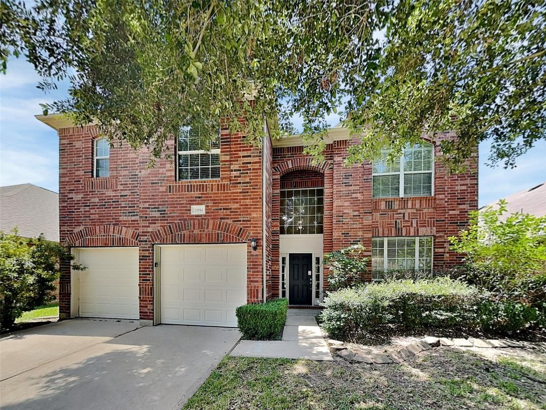 Attached, Exterior, Facade, Brick Facade, Brick Traditional
