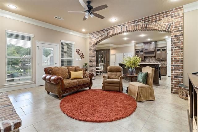 Fireplace, Interior, Kitchen, Living room, Recessed Lighting, Stainless Steel Appliances, Stone Walls