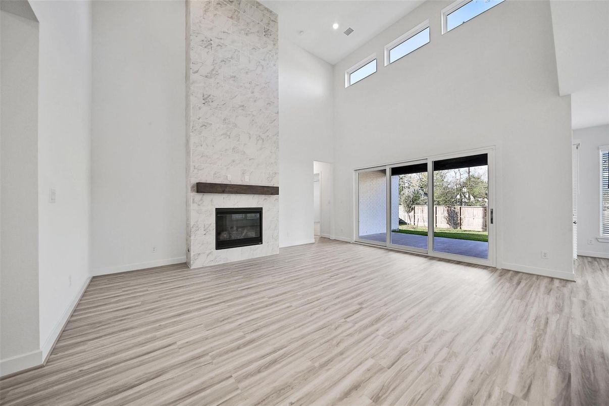 Empty room, Fireplace, Interior, Recessed Lighting, Wood Texture Flooring