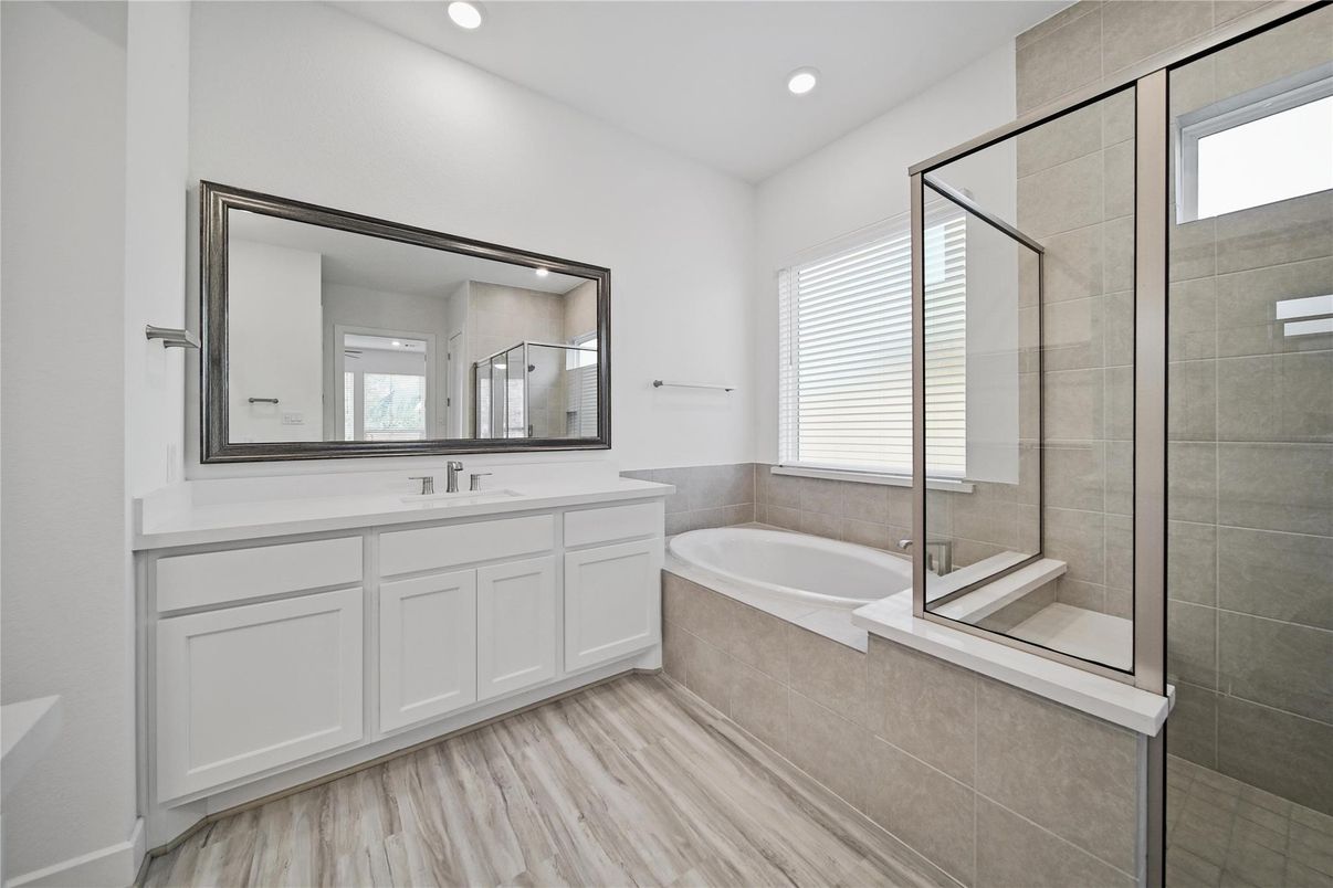 Bathroom, Dual Sink Vanities, Glass Shower, Interior, Recessed Lighting, Wood Texture Flooring