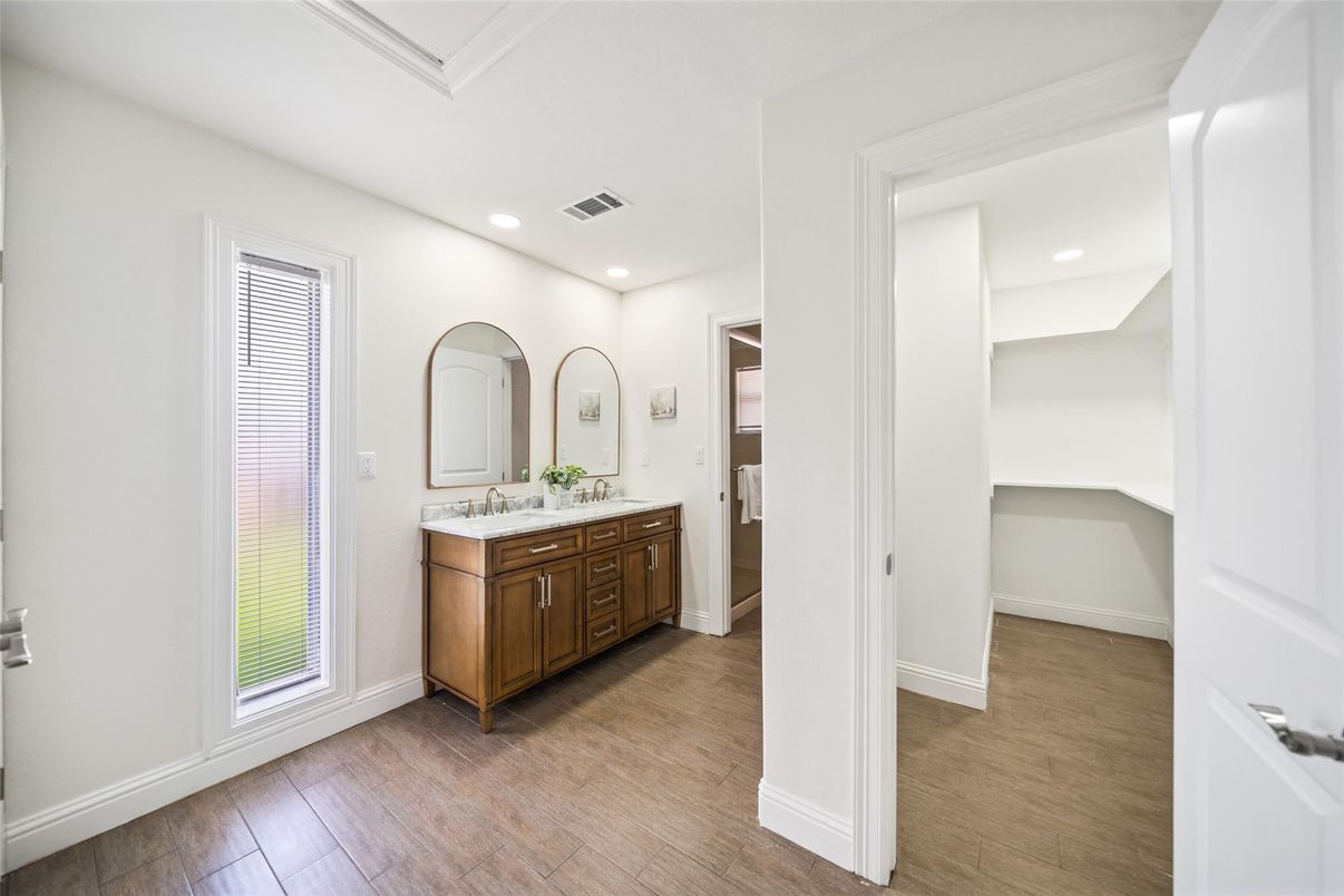 Bathroom, Dual Sink Vanities, Interior, Recessed Lighting, Wood Texture Flooring