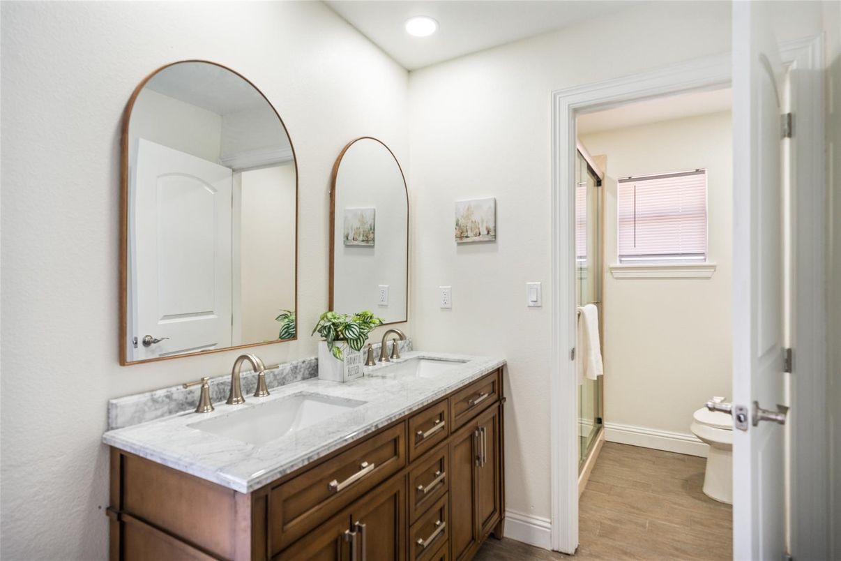 Bathroom, Dual Sink Vanities, Interior, Recessed Lighting, Wood Texture Flooring