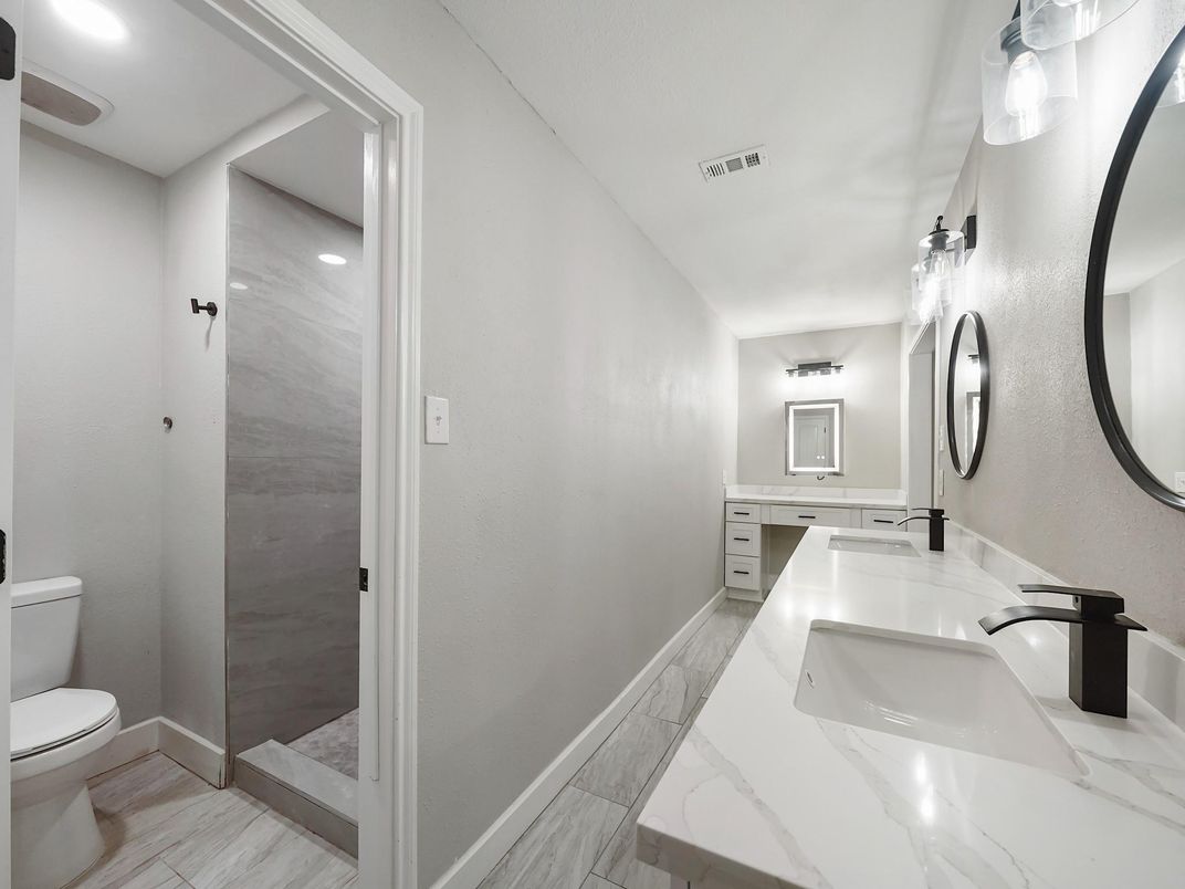 Bathroom, Dual Sink Vanities, Interior, Recessed Lighting, Wood Texture Flooring