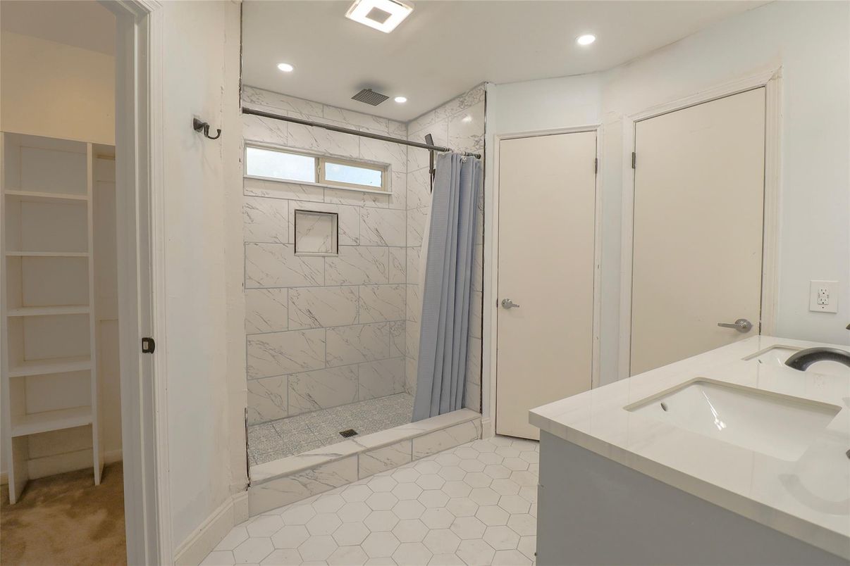Bathroom, Dual Sink Vanities, Interior, Marble Walls, Recessed Lighting