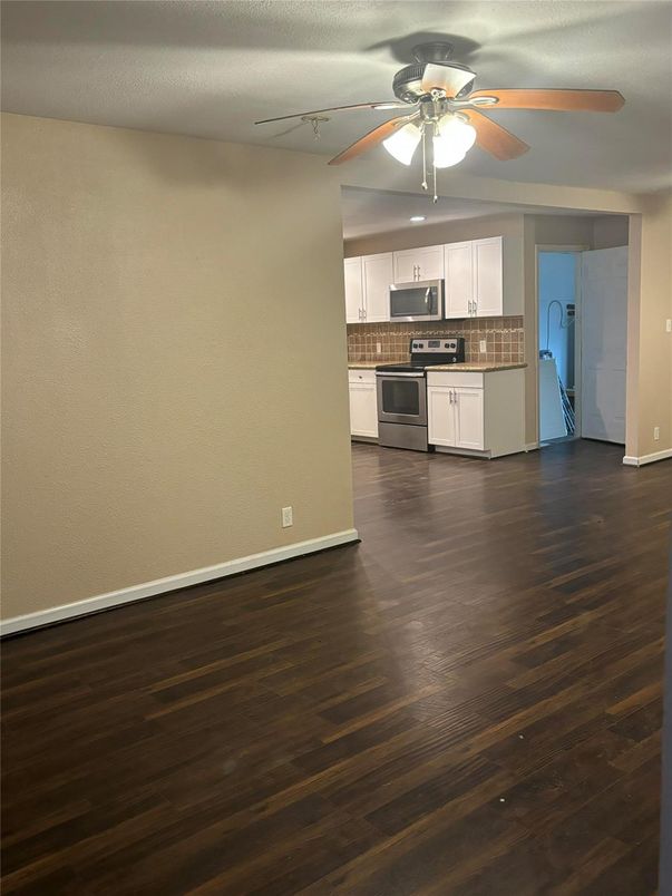 Empty room, Interior, Kitchen, Stainless Steel Appliances, Wood Texture Flooring