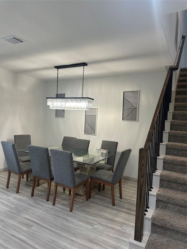 Chandelier, Dining room, Interior, Pendant Lights, Wood Texture Flooring