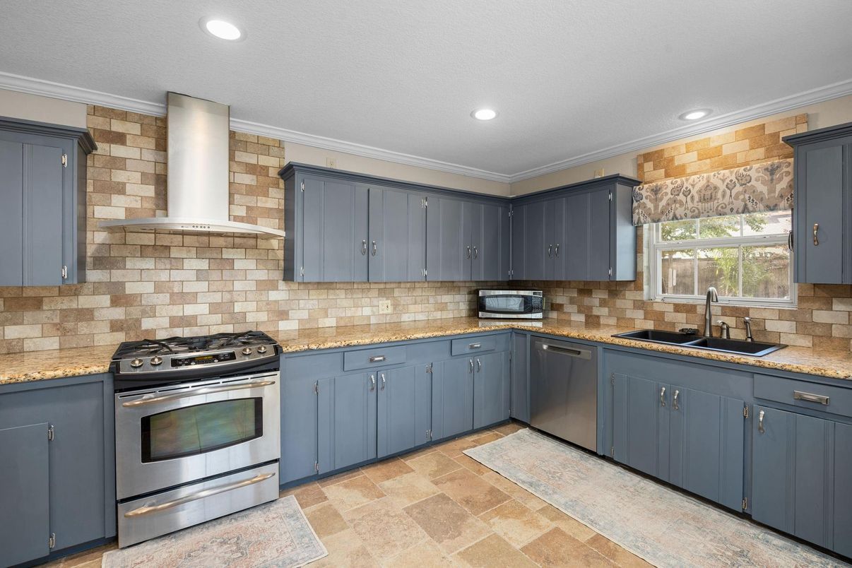 Interior, Kitchen, Recessed Lighting, Stainless Steel Appliances, Stone Walls