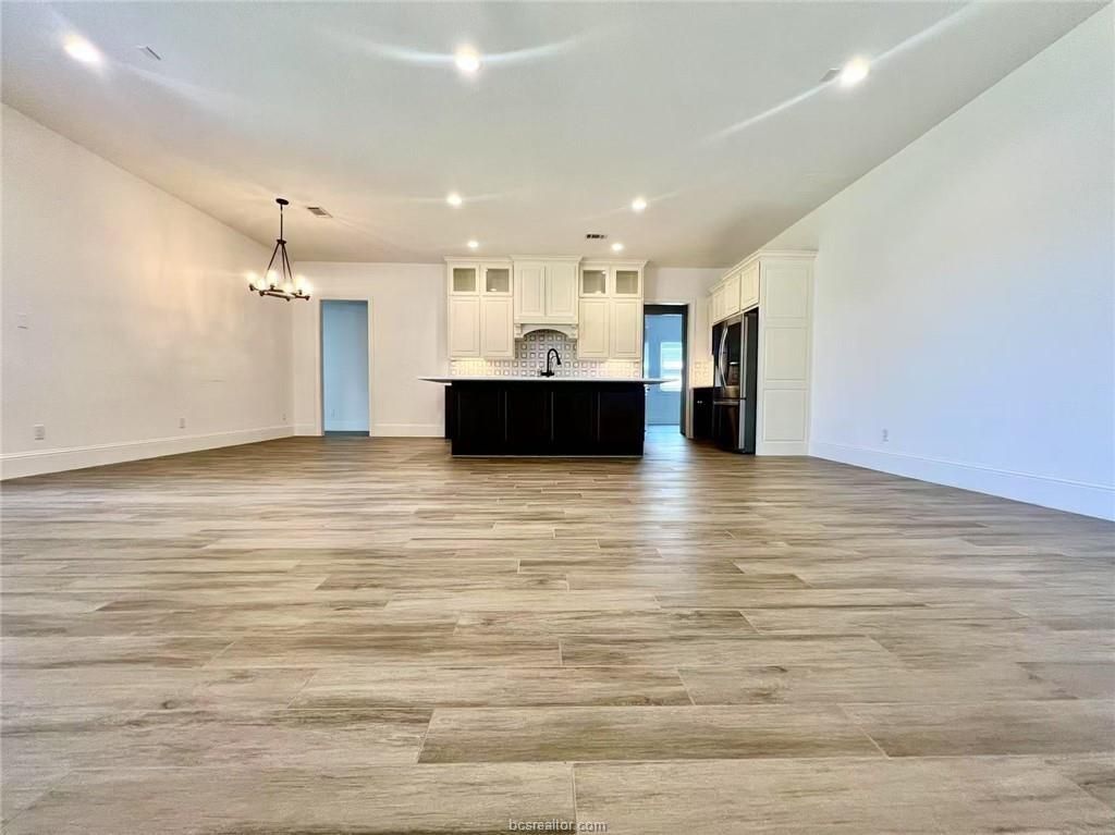 Empty room, Interior, Kitchen, Pendant Lights, Recessed Lighting, Wood Texture Flooring
