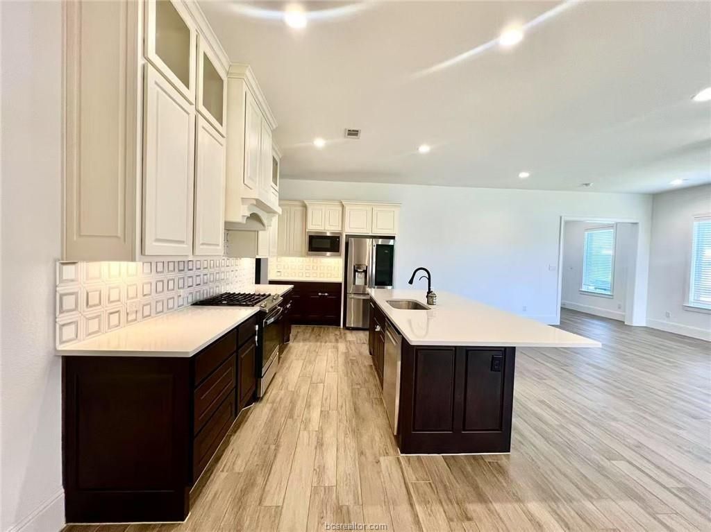 Interior, Kitchen, Recessed Lighting, Stainless Steel Appliances, Wood Texture Flooring