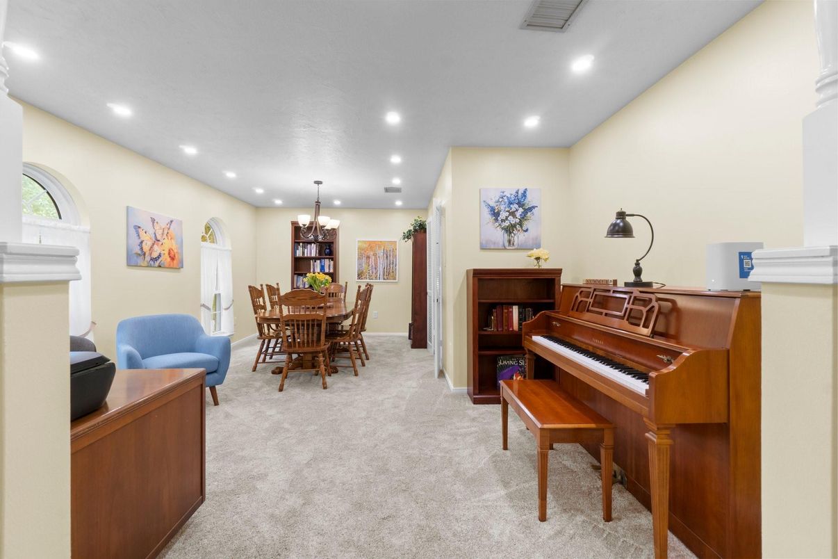 Chandelier, Dining room, Interior, Piano, Recessed Lighting