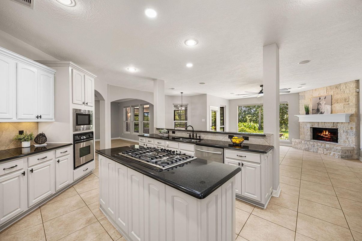 Fireplace, Interior, Kitchen, Pendant Lights, Recessed Lighting, Stainless Steel Appliances