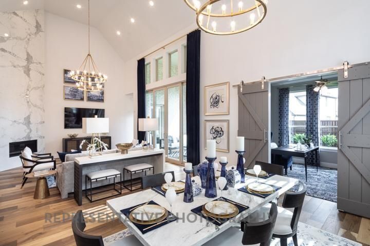 Chandelier, Dining room, Fireplace, Interior, Living room, Marble Walls, Pendant Lights, Recessed Lighting, Wood Texture Flooring