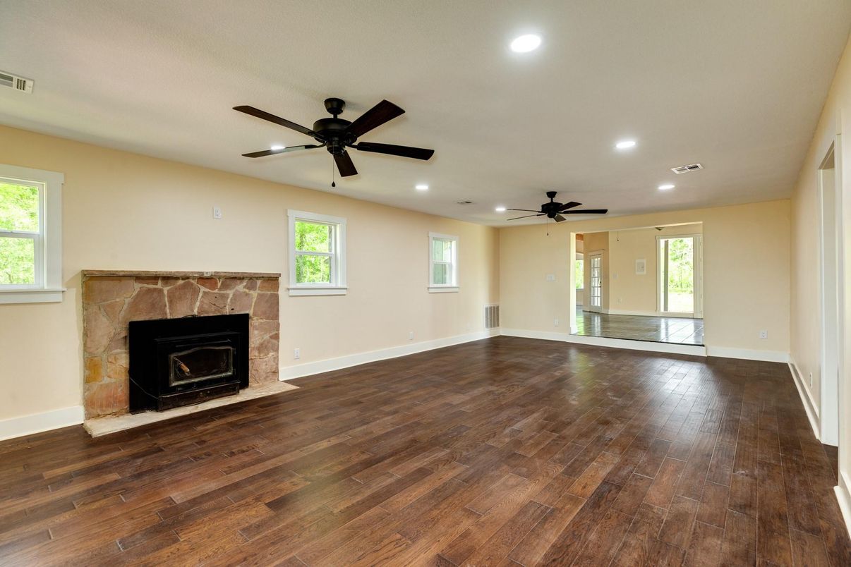 Empty room, Fireplace, Interior, Recessed Lighting, Wood Texture Flooring