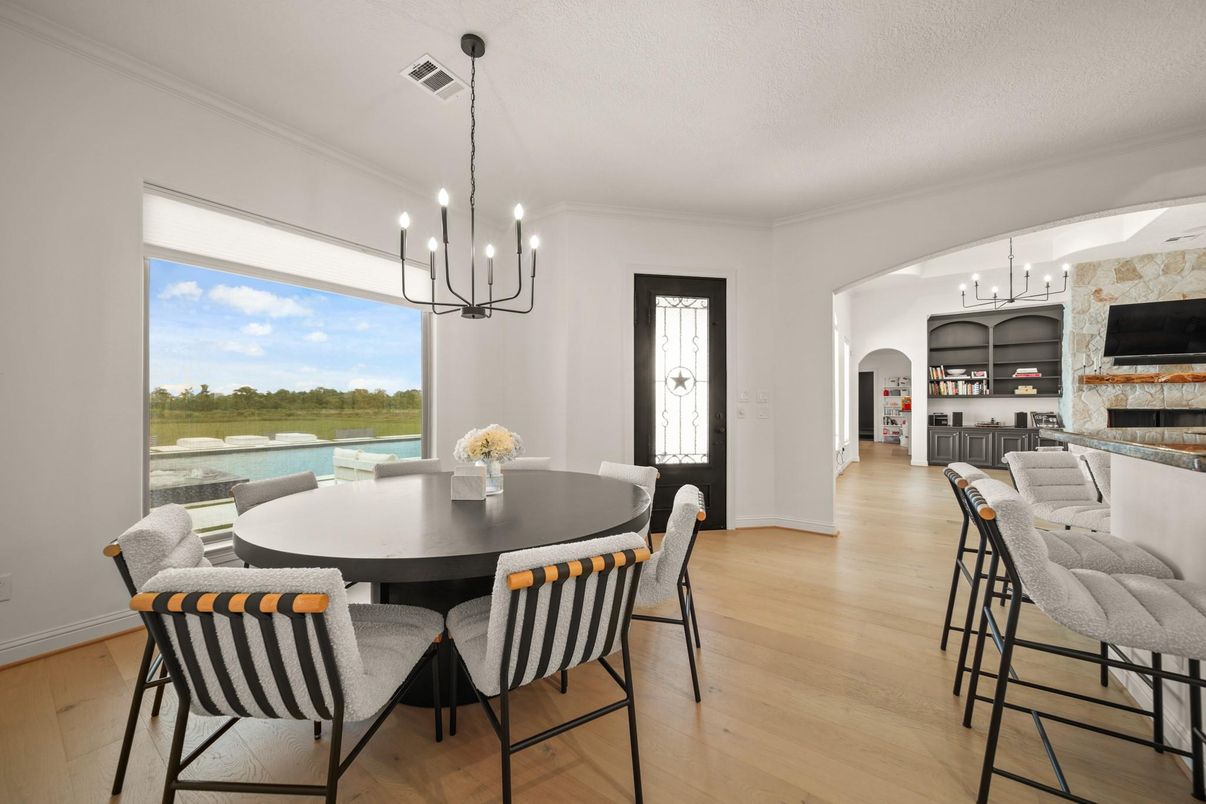 Dining room, Fireplace, Interior, Pendant Lights, Wood Texture Flooring