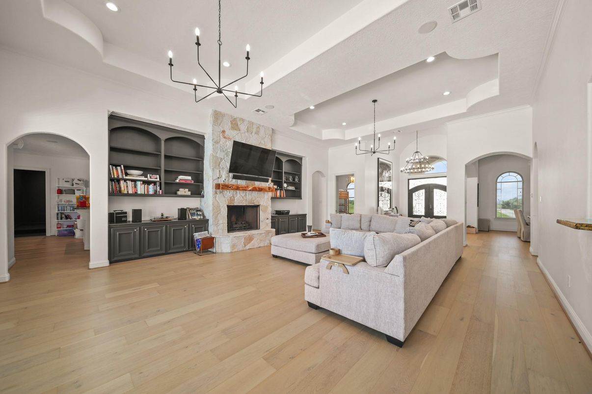 Chandelier, Fireplace, Interior, Living room, Pendant Lights, Recessed Lighting, Wood Texture Flooring