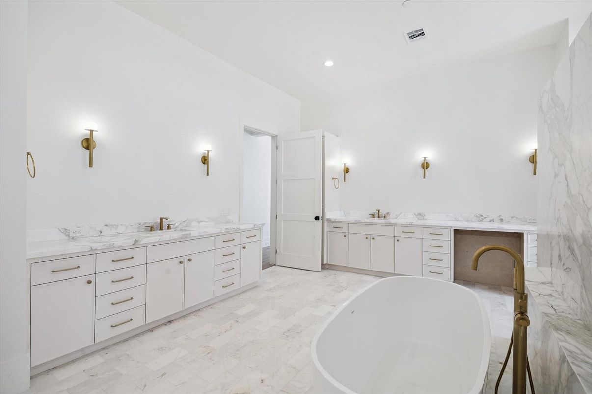 Bathroom, Dual Sink Vanities, Free Standing Baths, Interior, Marble Walls, Recessed Lighting, Wood Texture Flooring