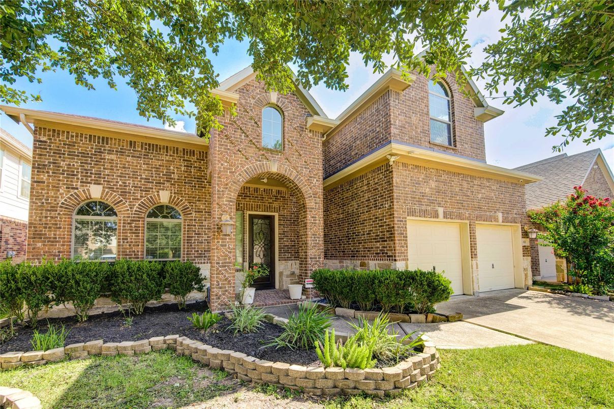 Attached, Exterior, Facade, Brick Facade, Brick Traditional