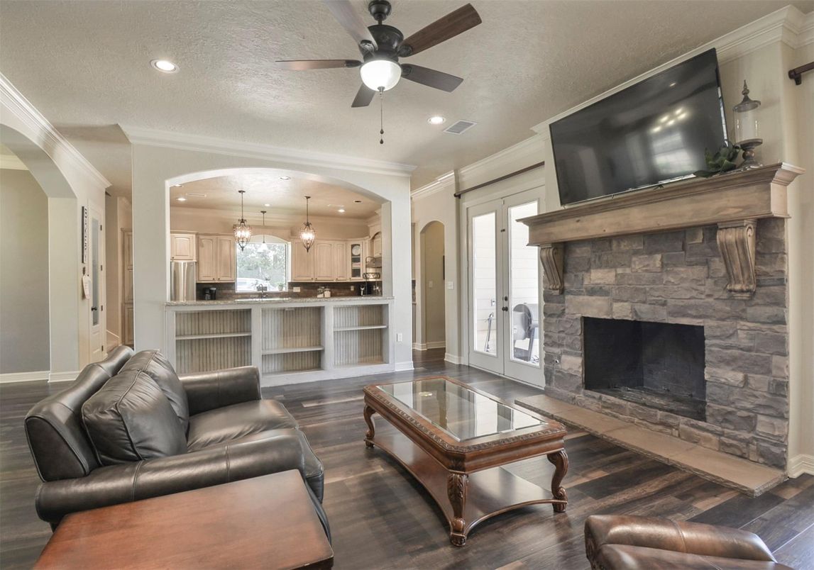 Fireplace, Interior, Kitchen, Living room, Pendant Lights, Recessed Lighting, Stainless Steel Appliances, Wood Texture Flooring