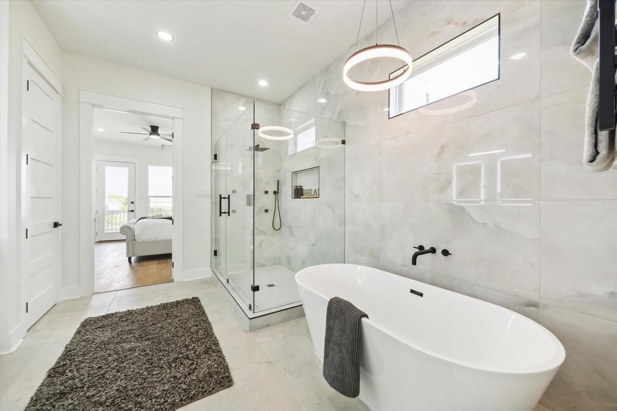 Bathroom, Free Standing Baths, Glass Shower, Interior, Marble Walls, Pendant Lights, Recessed Lighting