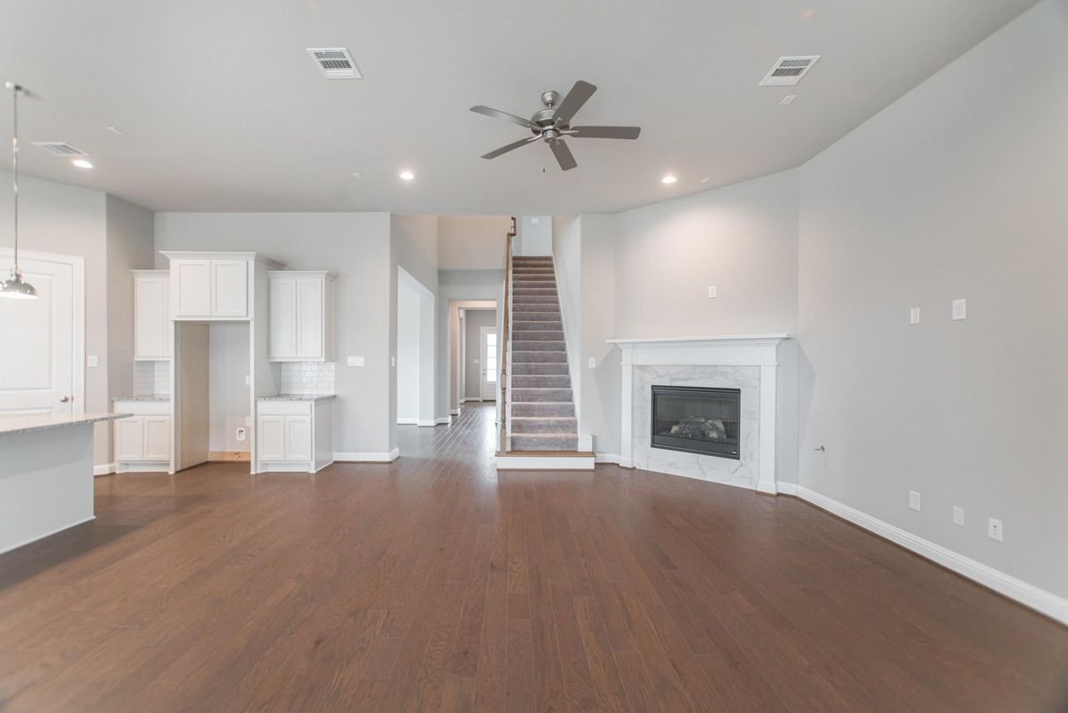 Empty room, Fireplace, Interior, Pendant Lights, Recessed Lighting, Wood Texture Flooring