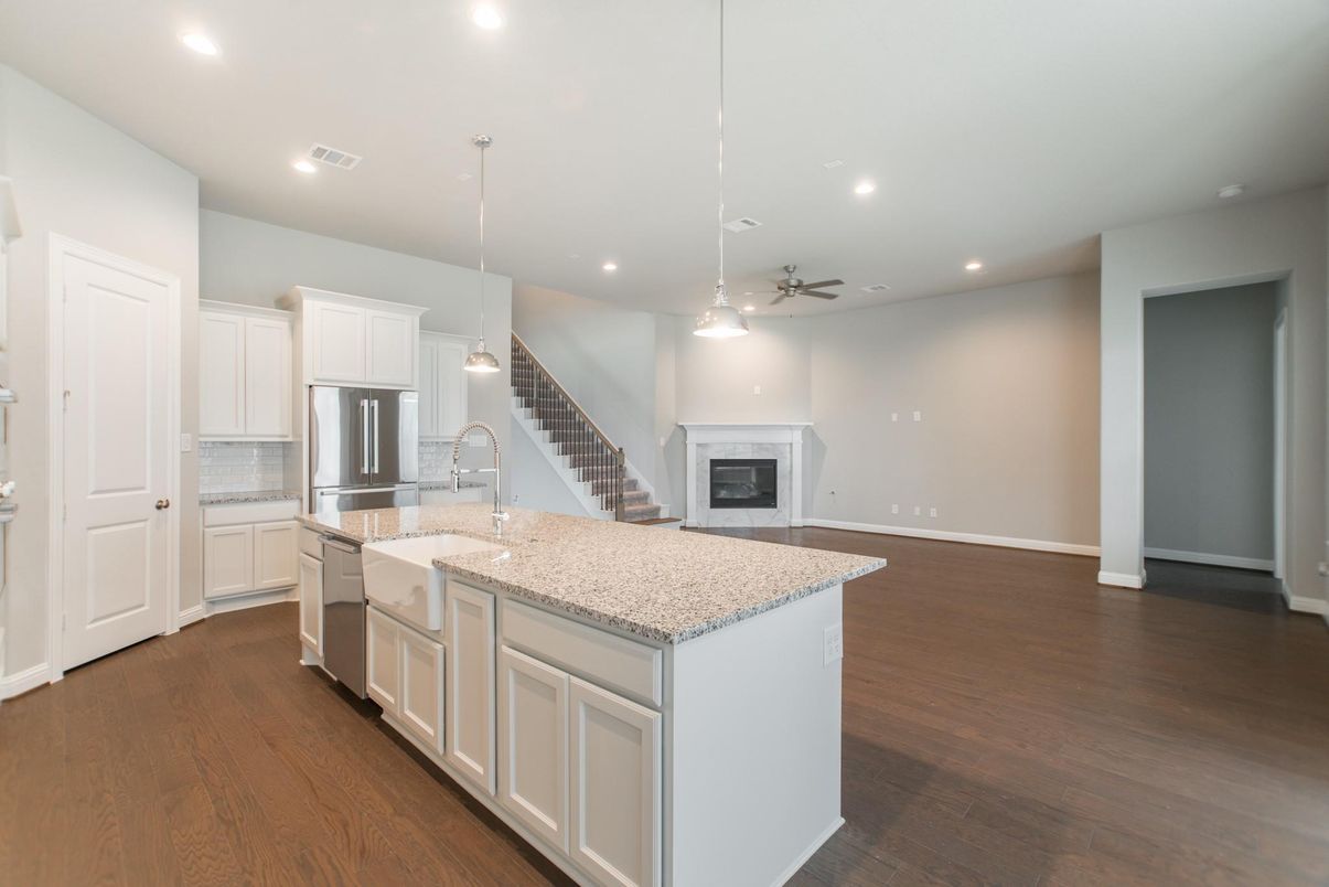Fireplace, Interior, Kitchen, Pendant Lights, Recessed Lighting, Stainless Steel Appliances, Wood Texture Flooring