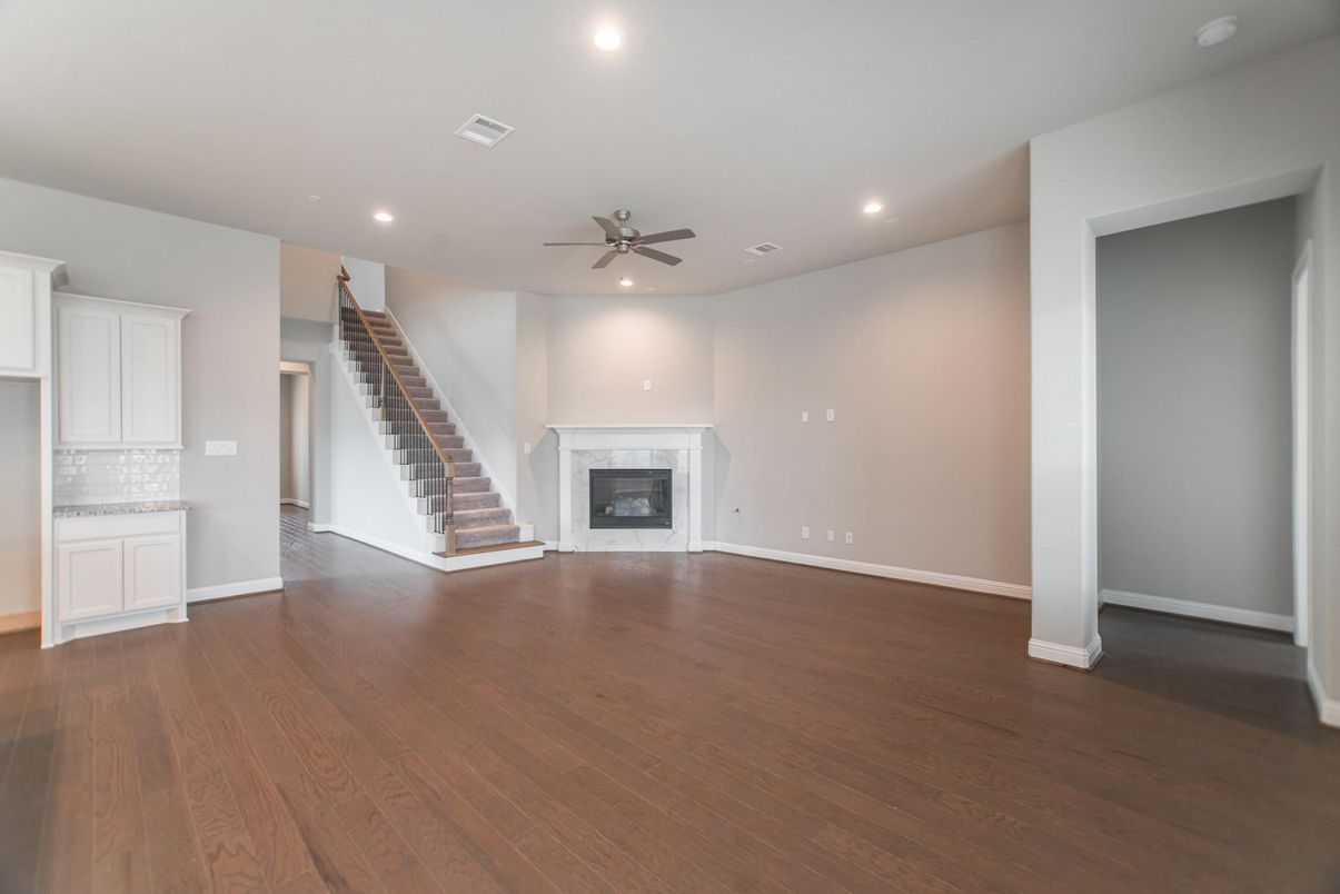 Empty room, Fireplace, Interior, Recessed Lighting, Wood Texture Flooring