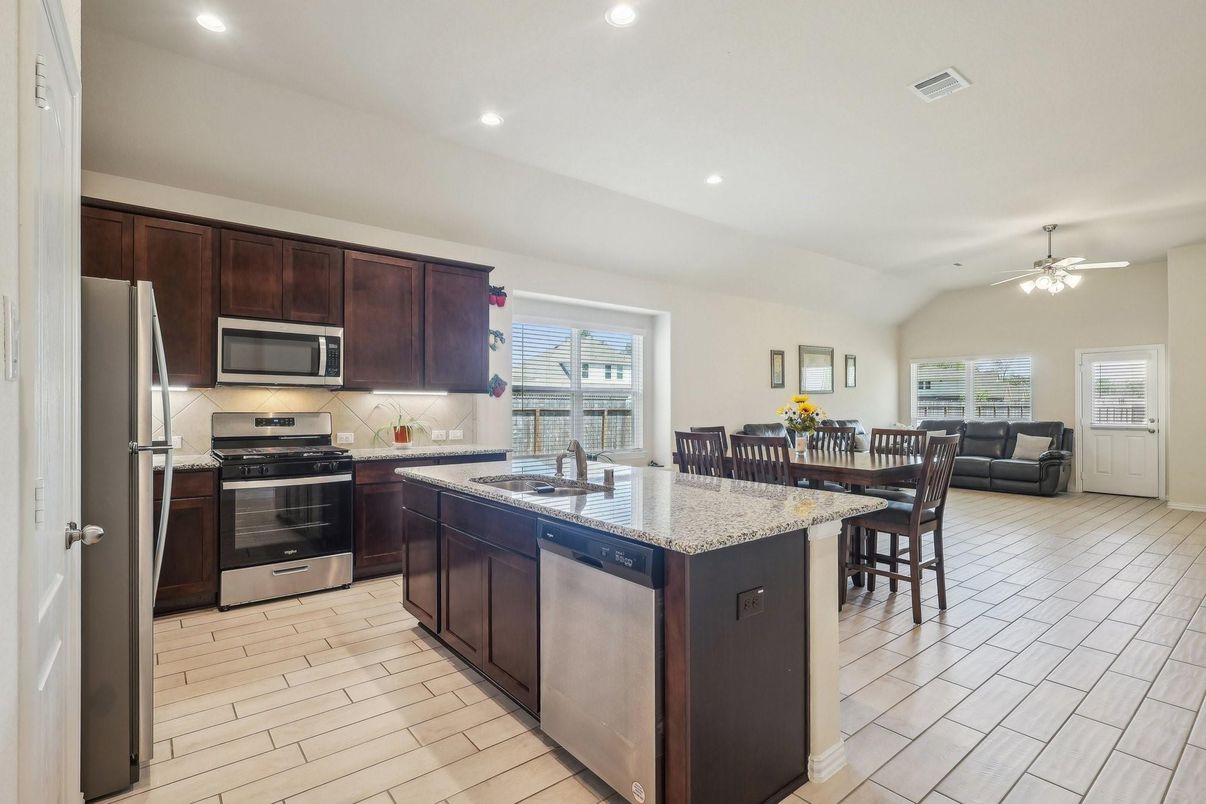 Dining room, Interior, Kitchen, Living room, Recessed Lighting, Stainless Steel Appliances, Wood Texture Flooring