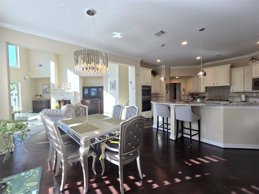 Chandelier, Dining room, Fireplace, Interior, Kitchen, Pendant Lights, Recessed Lighting, Wood Texture Flooring