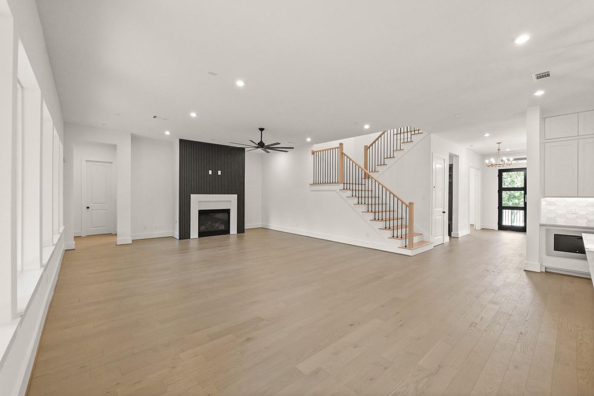 Empty room, Fireplace, Interior, Pendant Lights, Recessed Lighting, Wood Texture Flooring
