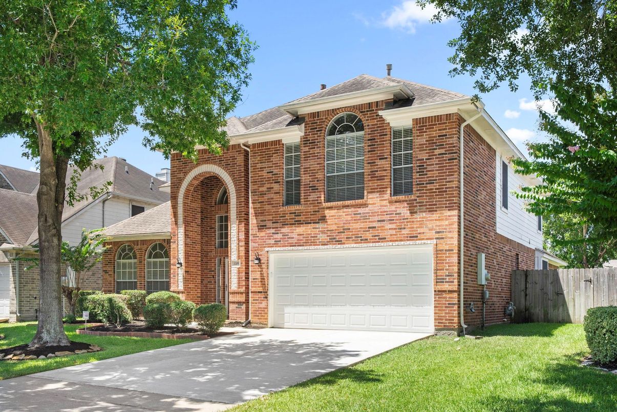 Attached, Exterior, Facade, Brick Facade, Brick Traditional