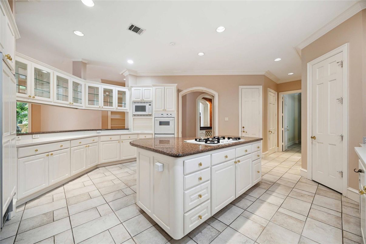 Chandelier, Dining room, Fireplace, Interior, Living room, Recessed Lighting, Wood Texture Flooring
