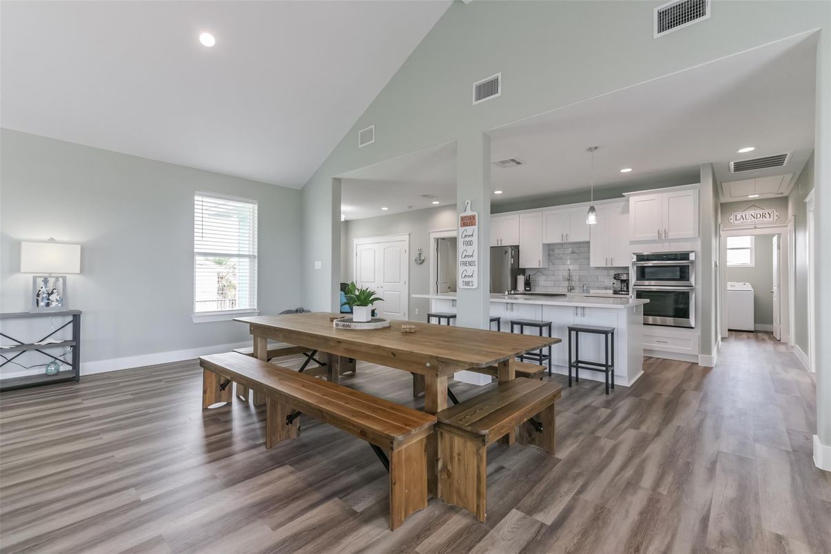 Dining room, Interior, Kitchen, Pendant Lights, Recessed Lighting, Stainless Steel Appliances, Wood Texture Flooring