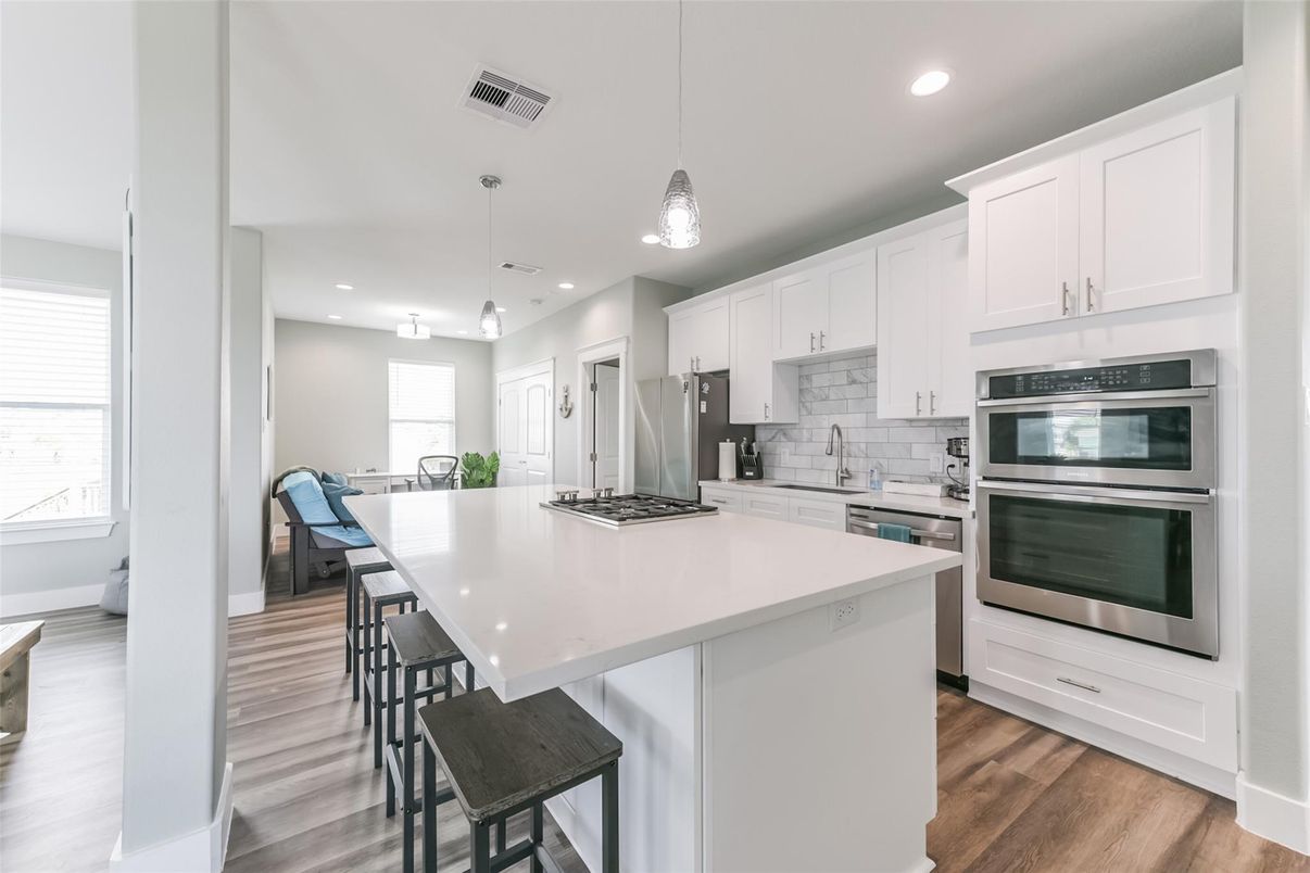 Interior, Kitchen, Pendant Lights, Recessed Lighting, Stainless Steel Appliances, Wood Texture Flooring