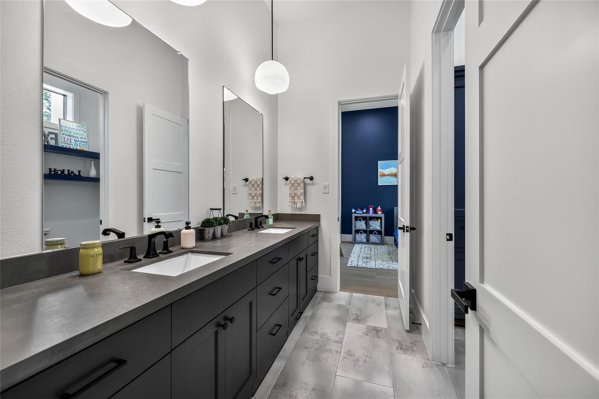 Bathroom, Dual Sink Vanities, Interior, Marble, Pendant Lights, Wood Texture Flooring